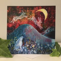 painted image of a hare under a hill and 2 hares chasing the crescent moon